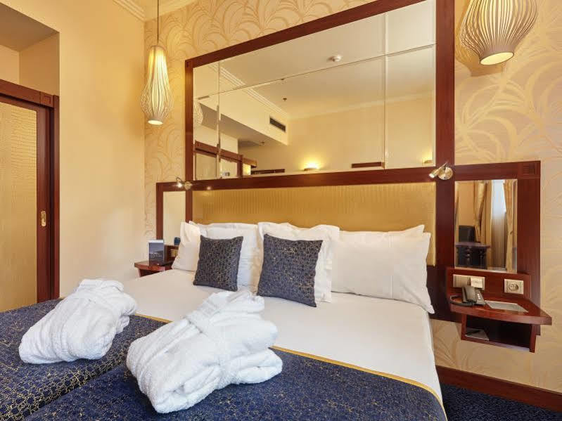 Occidental Praha Wilson Hotel Exterior foto A bedroom at the hotel